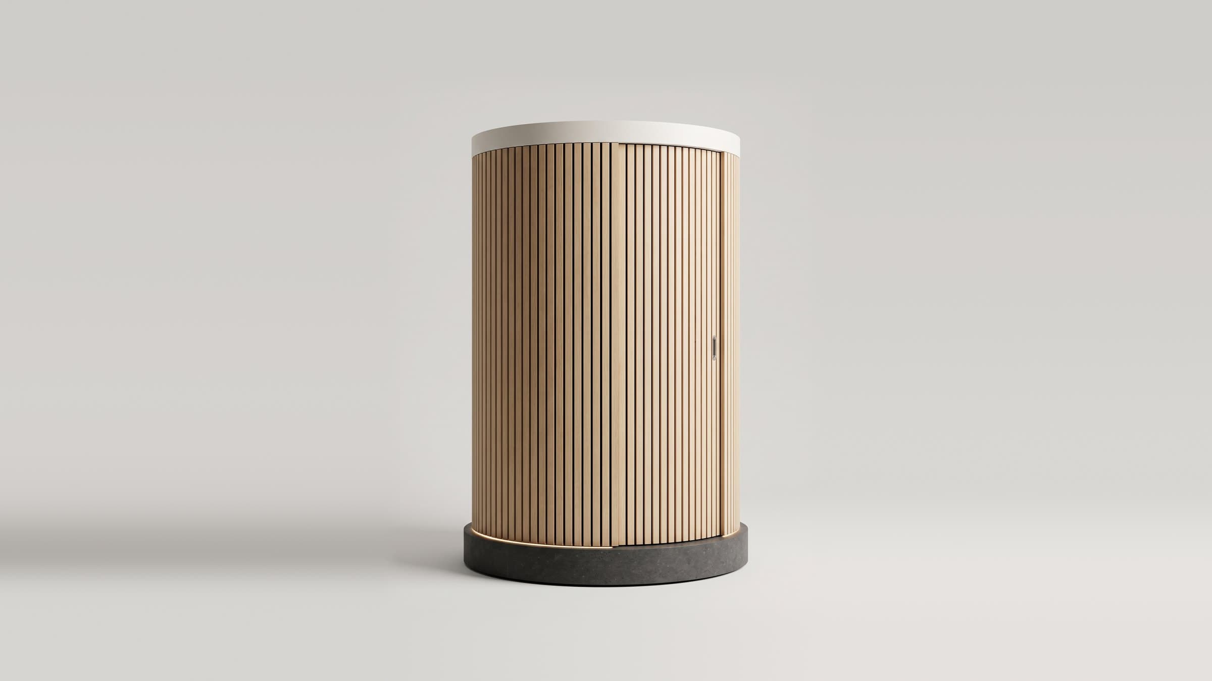 Soma Axon, closed: a round cabin of oak slats on a dark stone base