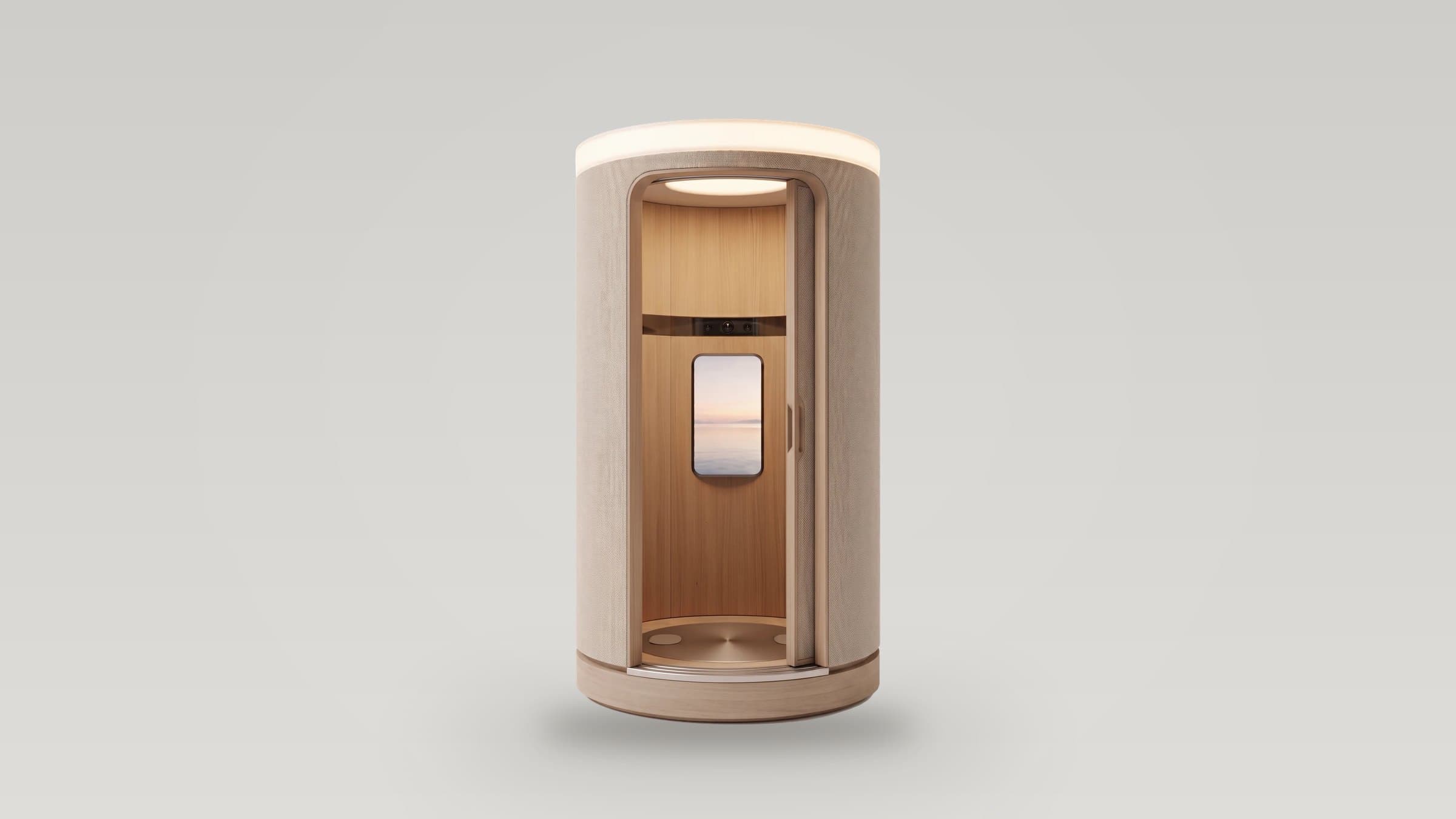 Soma Axon with its door slid open: a round cabin wrapped in knit under a glowing crown, light oak inside