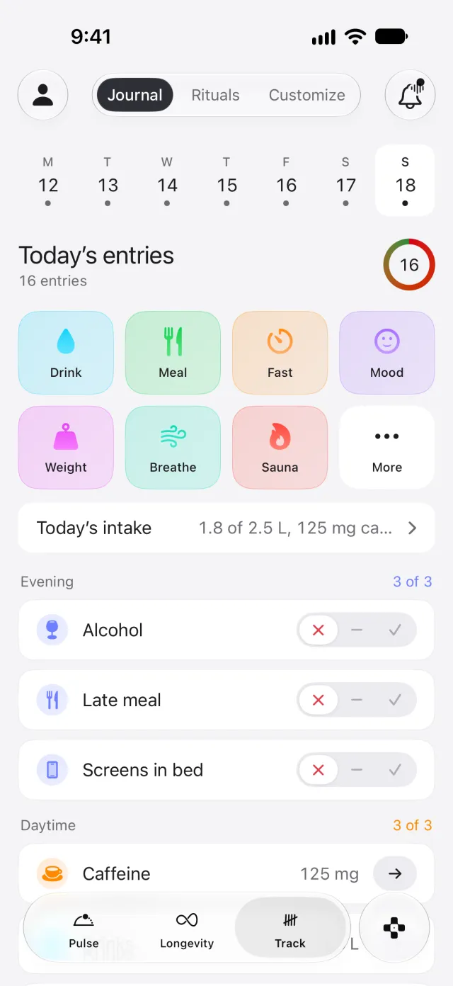 Prism's Track page, a journal with daily check-ins and rituals.